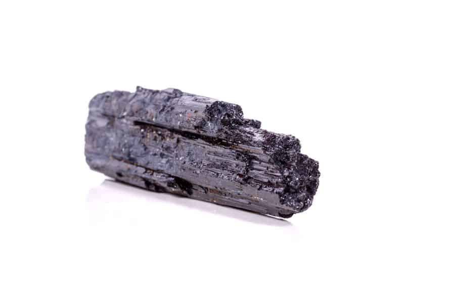 macro mineral stone sherle, schorl, black tourmaline on white background close-up-碧璽Tourmaline-電氣石